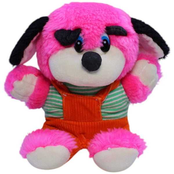 Pinker Hund mit oranger Latzhose