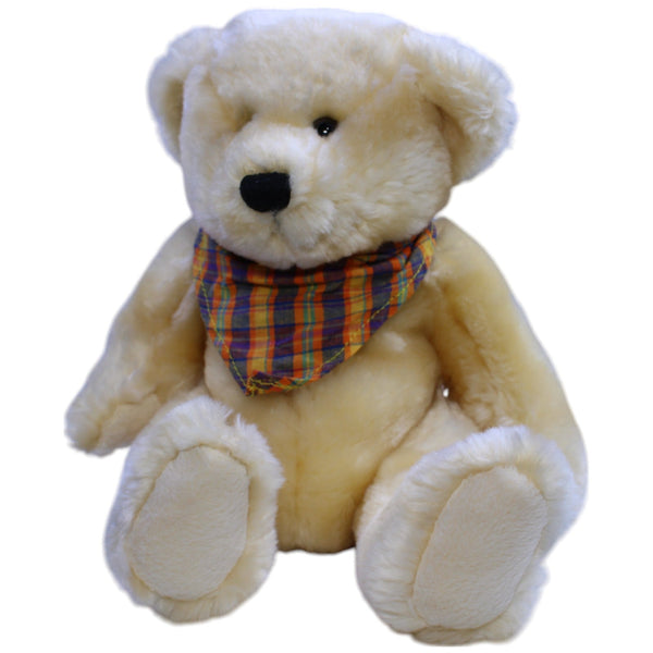 Beiger Teddybär mit buntem Halstuch, sitzend