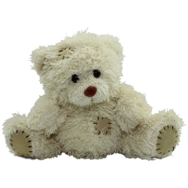 Cremefarbener Teddybär mit Patches