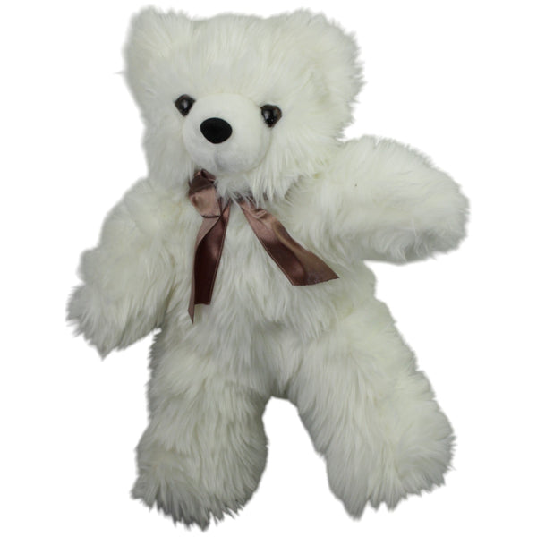 Weißer kuscheliger Teddy mit brauner Schleife