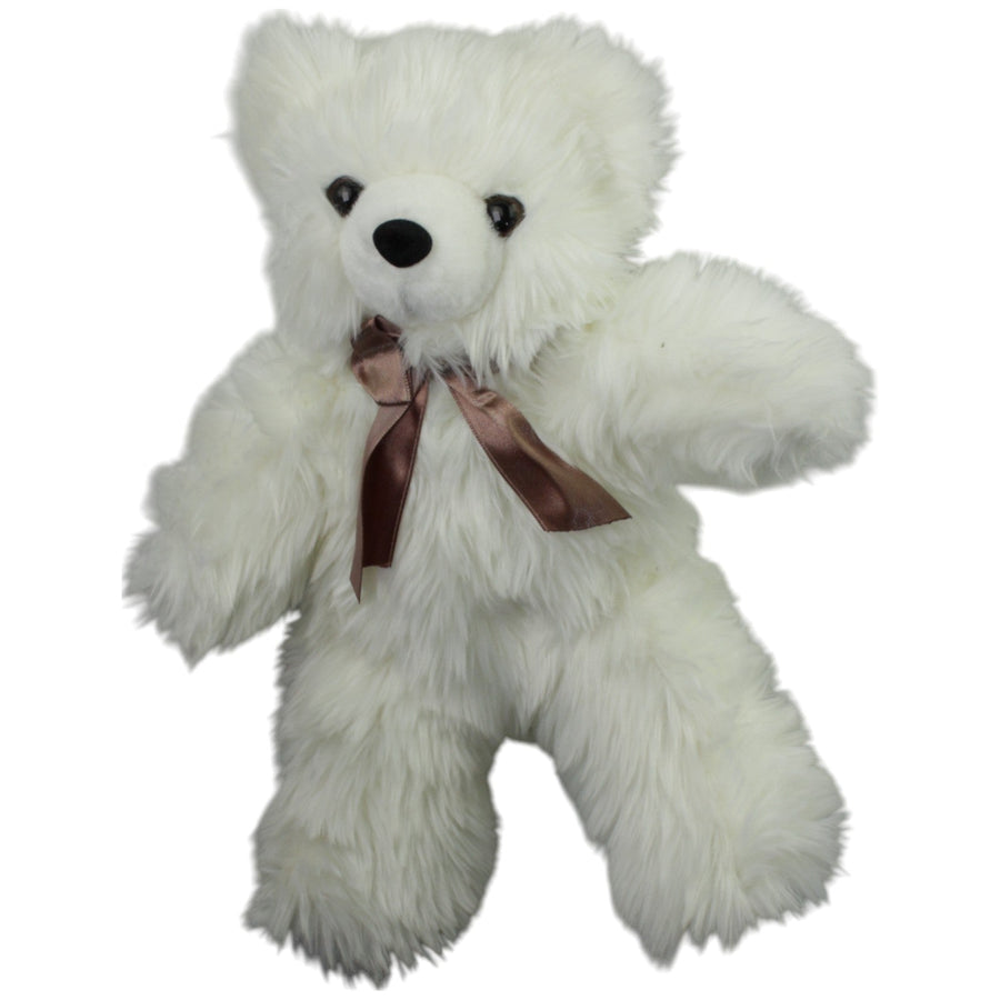 Weißer kuscheliger Teddy mit brauner Schleife