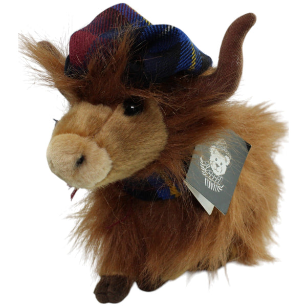 Highland Kuh mit Mütze und Schal