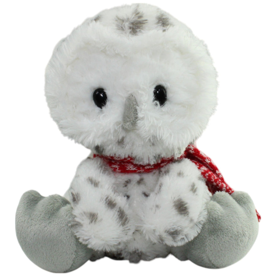 Schneeeule mit rotem Schal