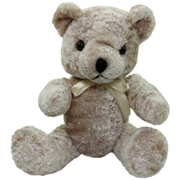 Kleiner grauer Teddy, sitzend