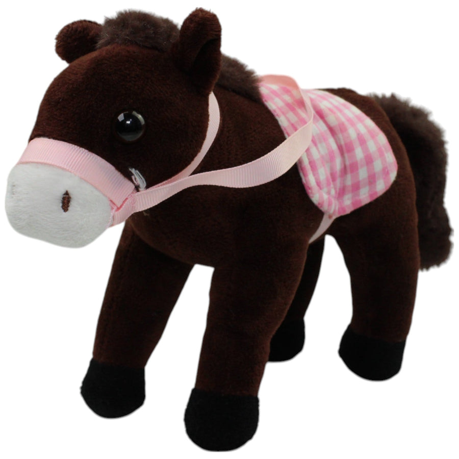 Braunes Pferd mit rosa Sattel und Zaumzeug