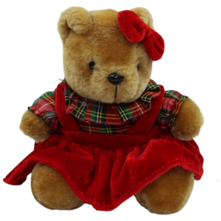 Teddybär mit rotem Kleid und Schleife