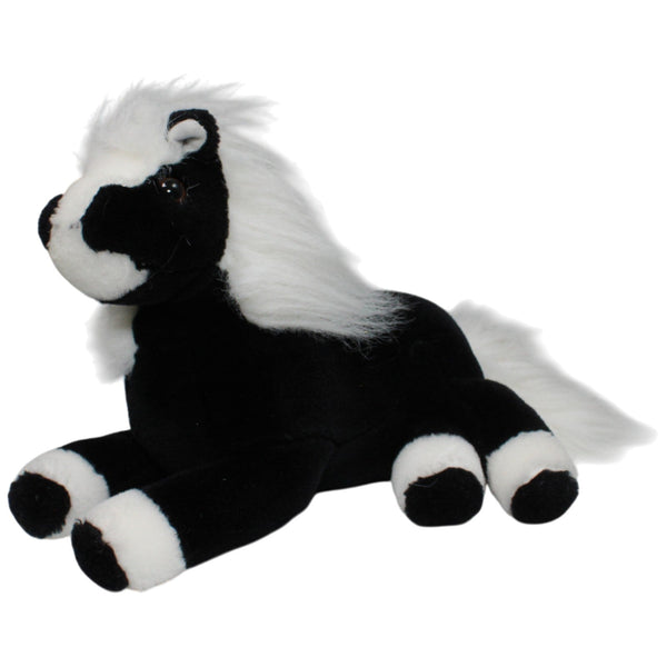 Schwarzes Pferd mit weißer Mähne, liegend