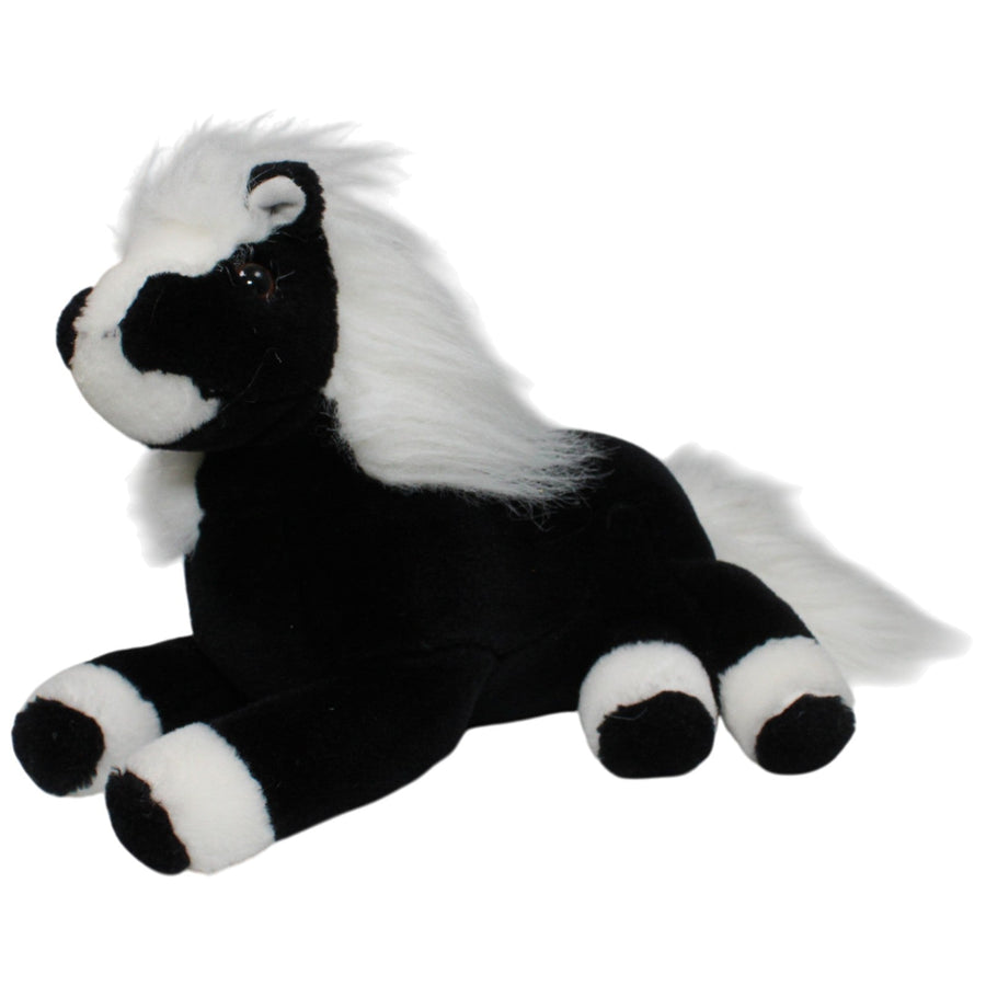 Schwarzes Pferd mit weißer Mähne, liegend