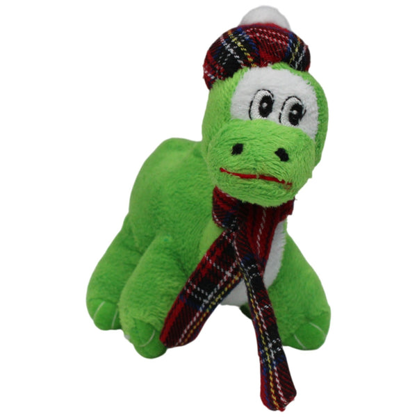 Ungeheuer von Loch Ness in Mütze und Schal mit Schottenkaro