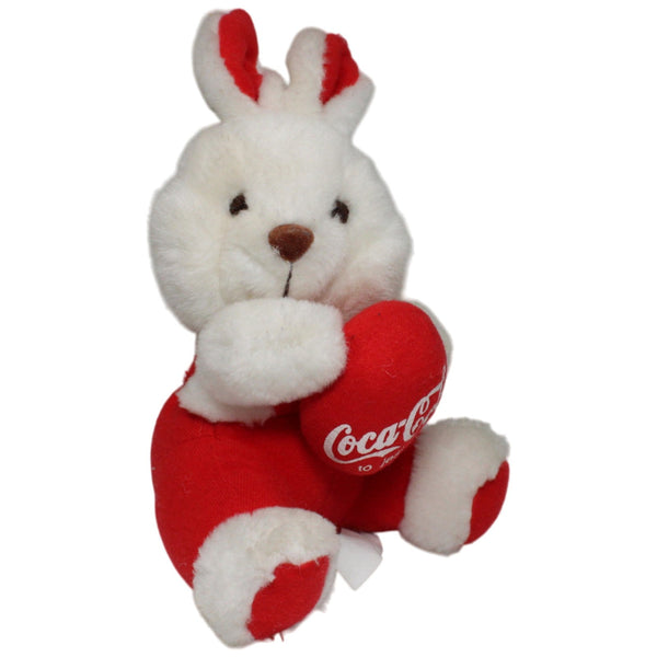 Coca-Cola, sitzender weißer Hase mit Ei "to jest radość"