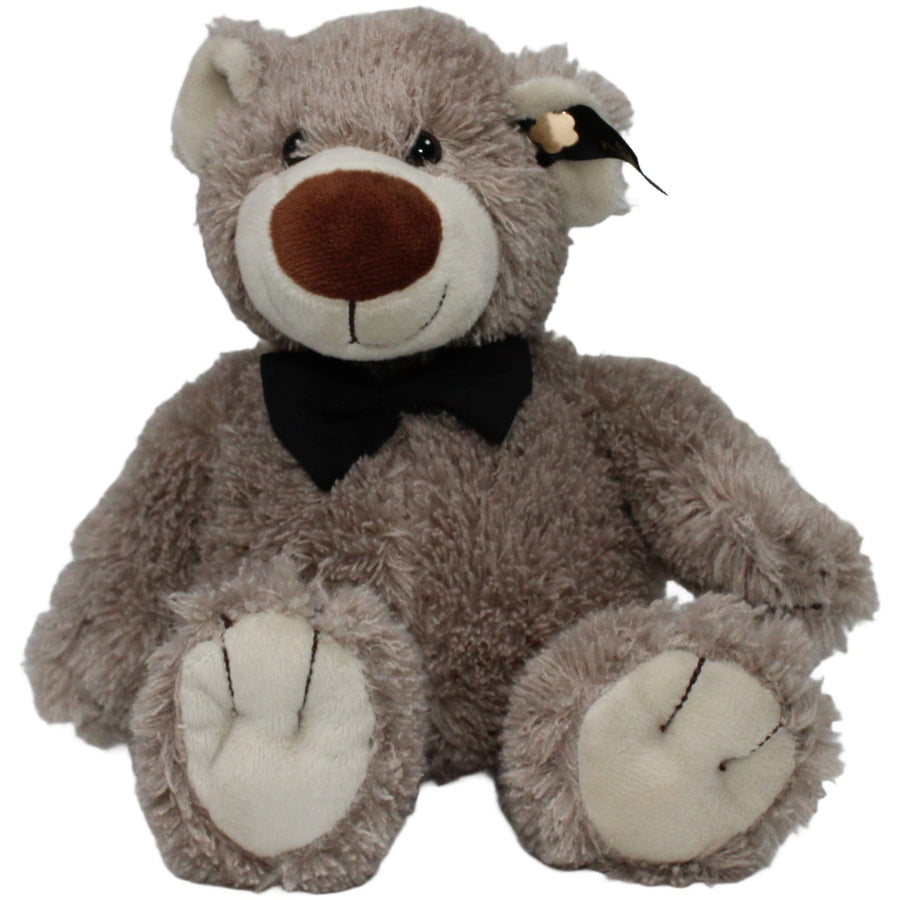 Zotteliger grauer Teddybär mit schwarzer Schleife