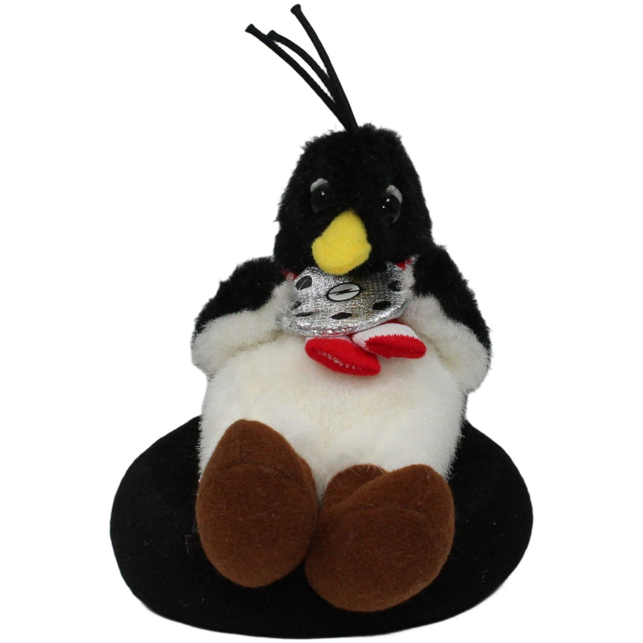 Pinguin auf Reifen mit Radkappe