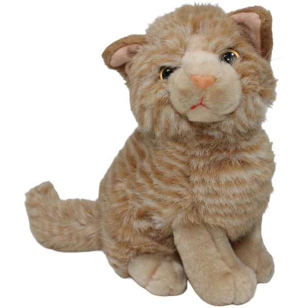 Orange-weiße Katze, sitzend