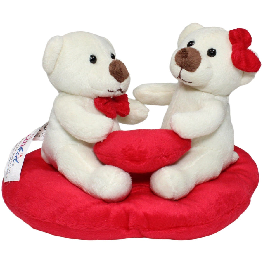 Süße Teddybären auf rotem Herz