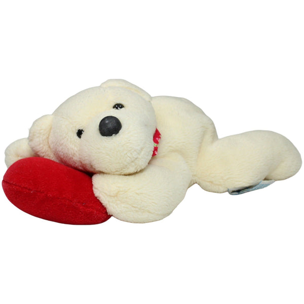Teddybär mit rotem Herz, liegend