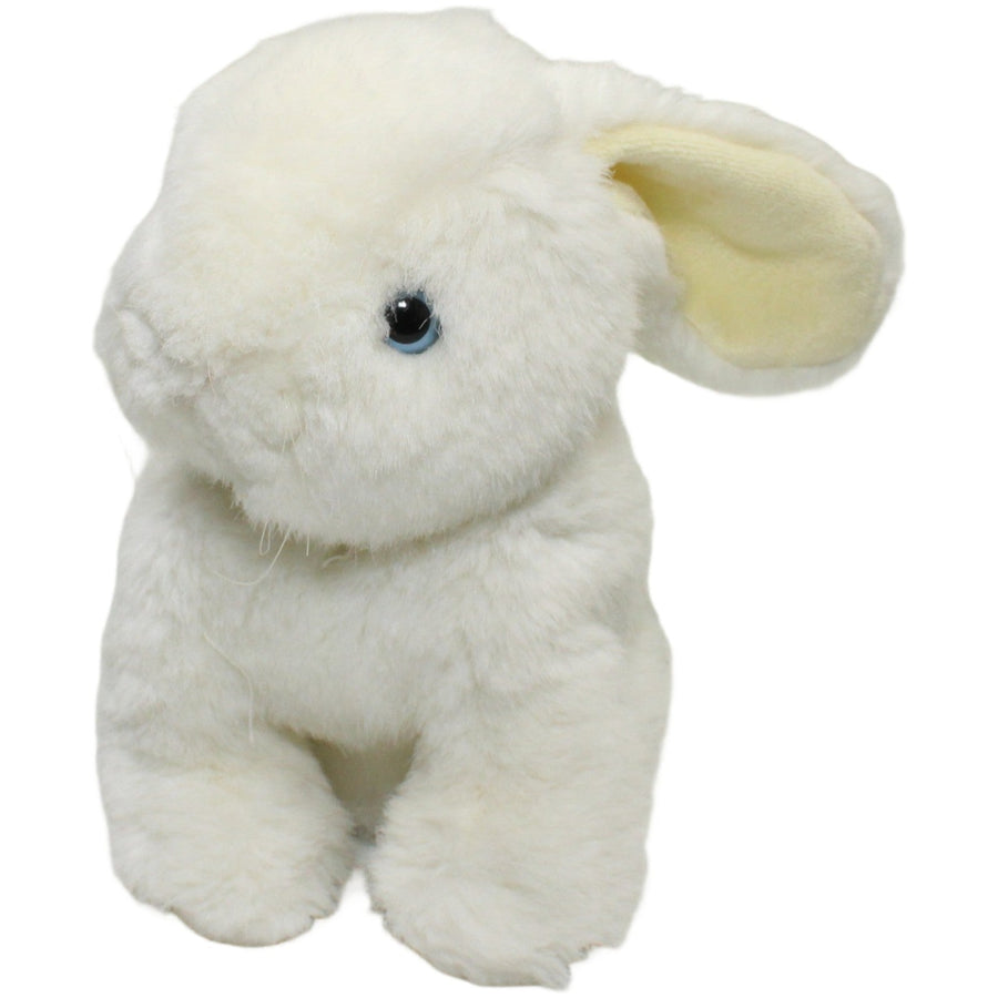 Süßer weißer Hase mit blauen Augen