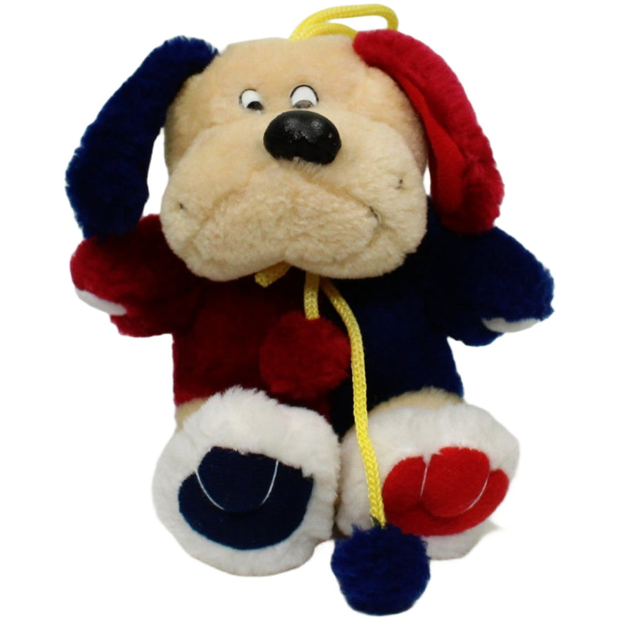Süßer bunter Hund, sitzend