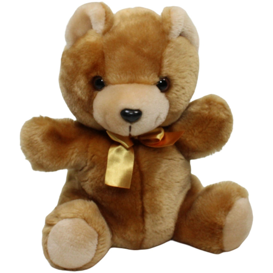 Schöner Teddy mit goldener Schleife