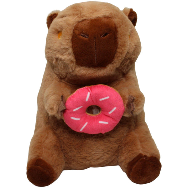 Süßer Capybara mit Donut, sitzend
