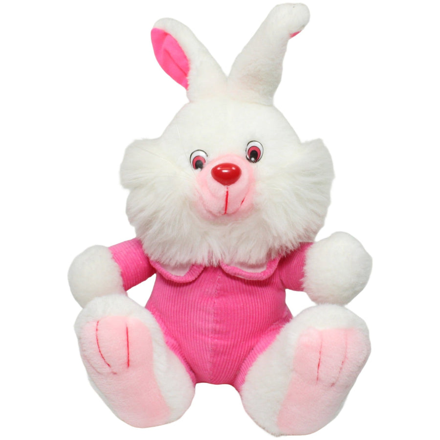 Weißer Hase mit pinkem Outfit, sitzend