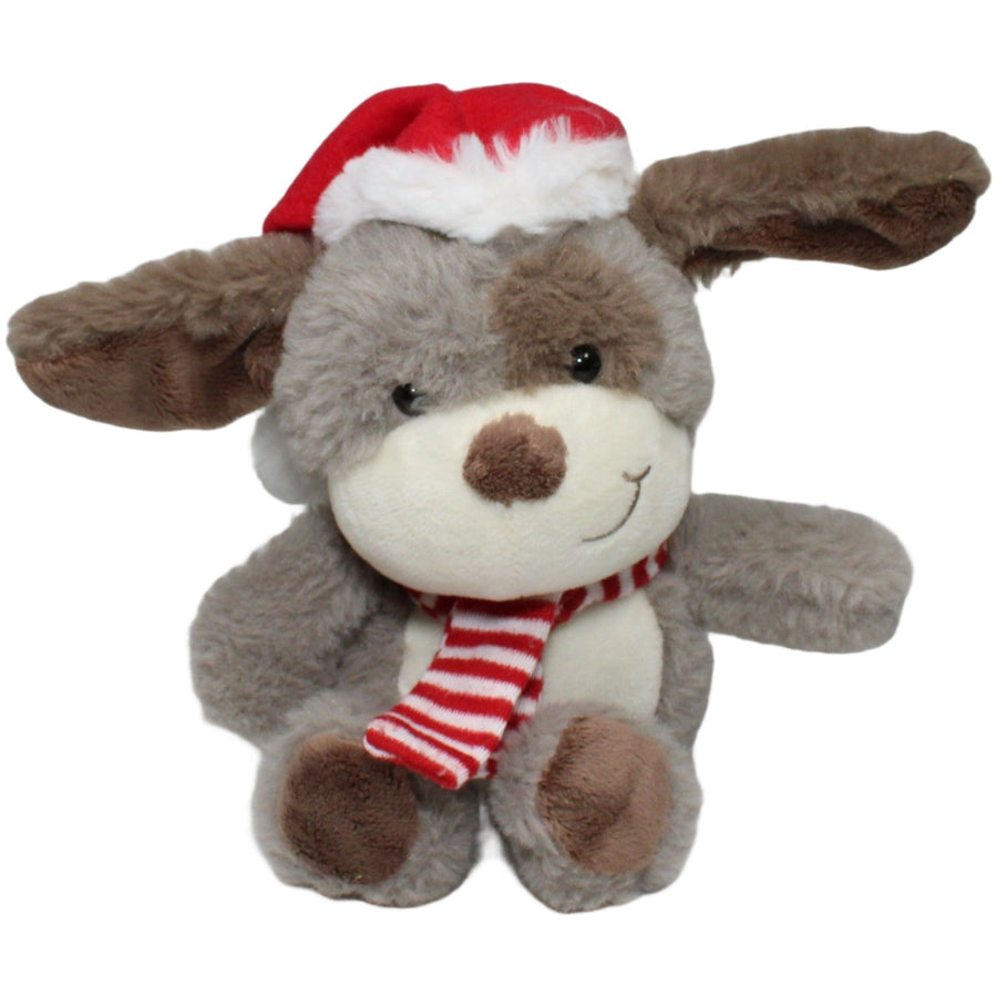 Grauer Hund mit Weihnachtsmütze und Schal, sitzend