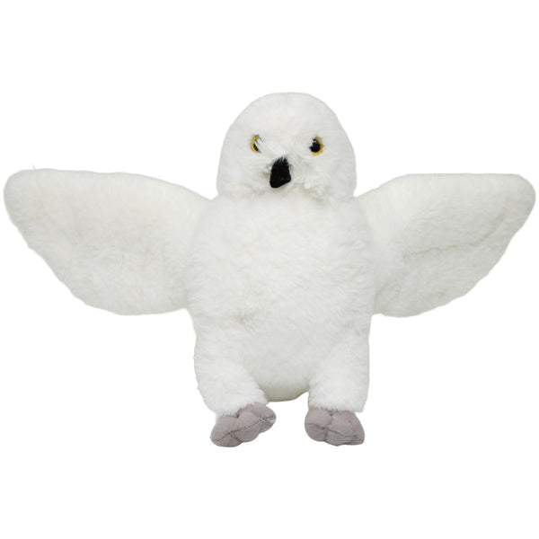Schneeeule mit ausgebreiteten Flügeln