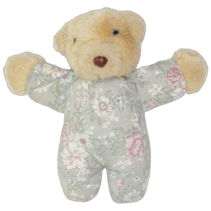 Süßer kleiner Teddy mit Blumenmuster