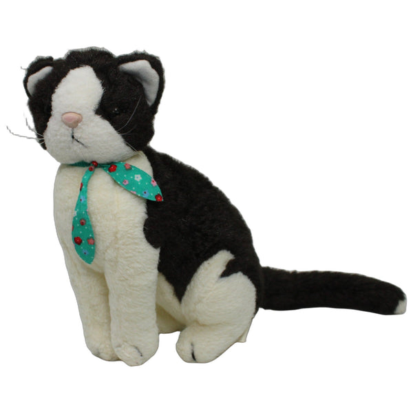 Schöne Katze mit Halstuch, sitzend