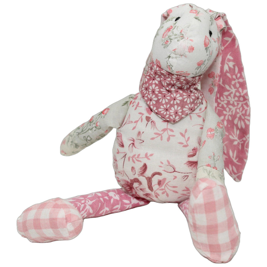 Weißer Hase mit rosa Blumenmuster