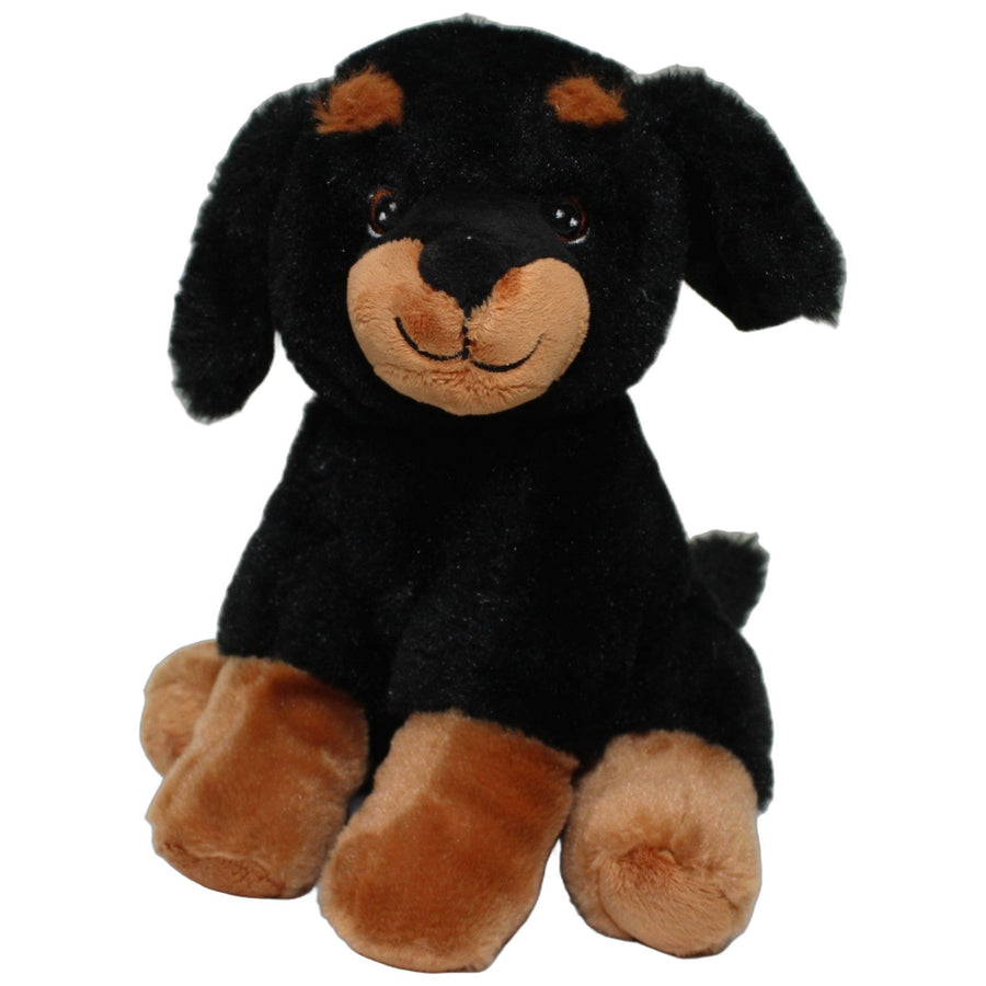 Superweicher Rottweiler Welpe, sitzend