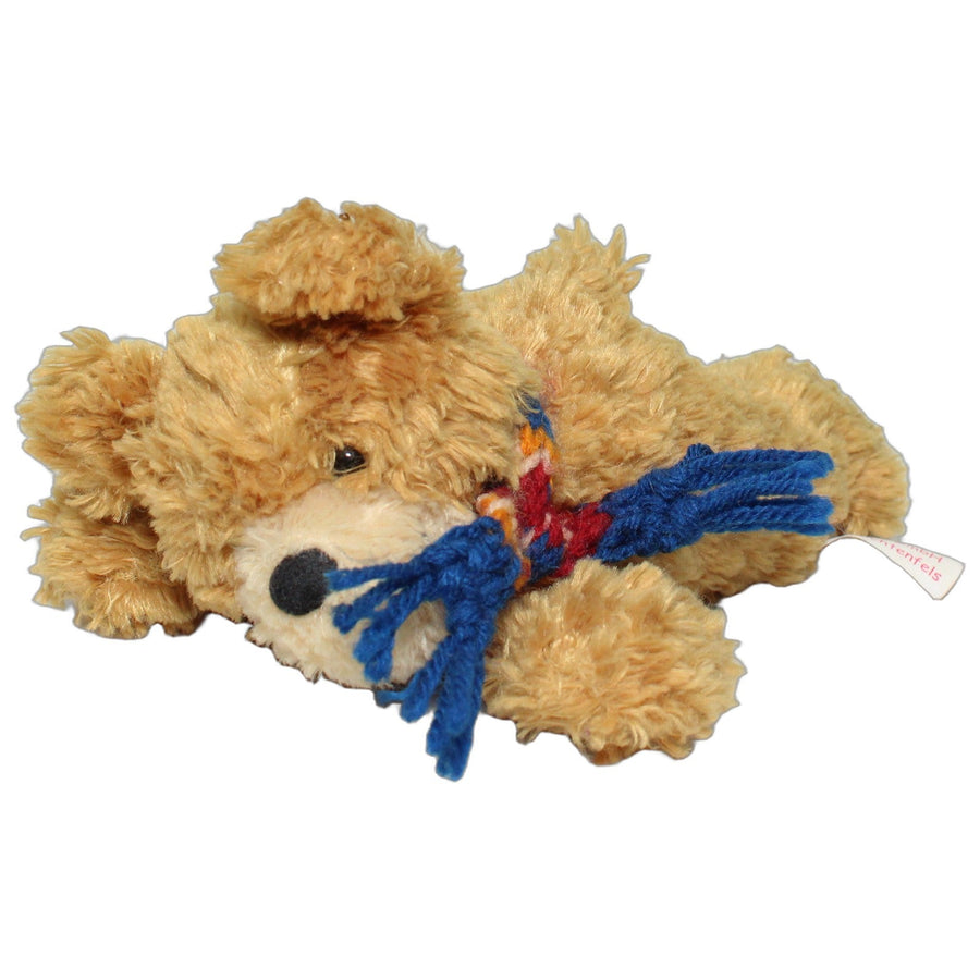 Süßer liegender brauner Teddy mit Schal