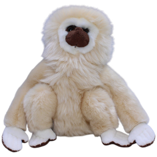 Weißhandgibbon, sitzend