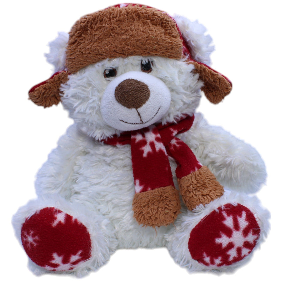 Weißer wuscheliger Teddybär mit Mütze und Schal