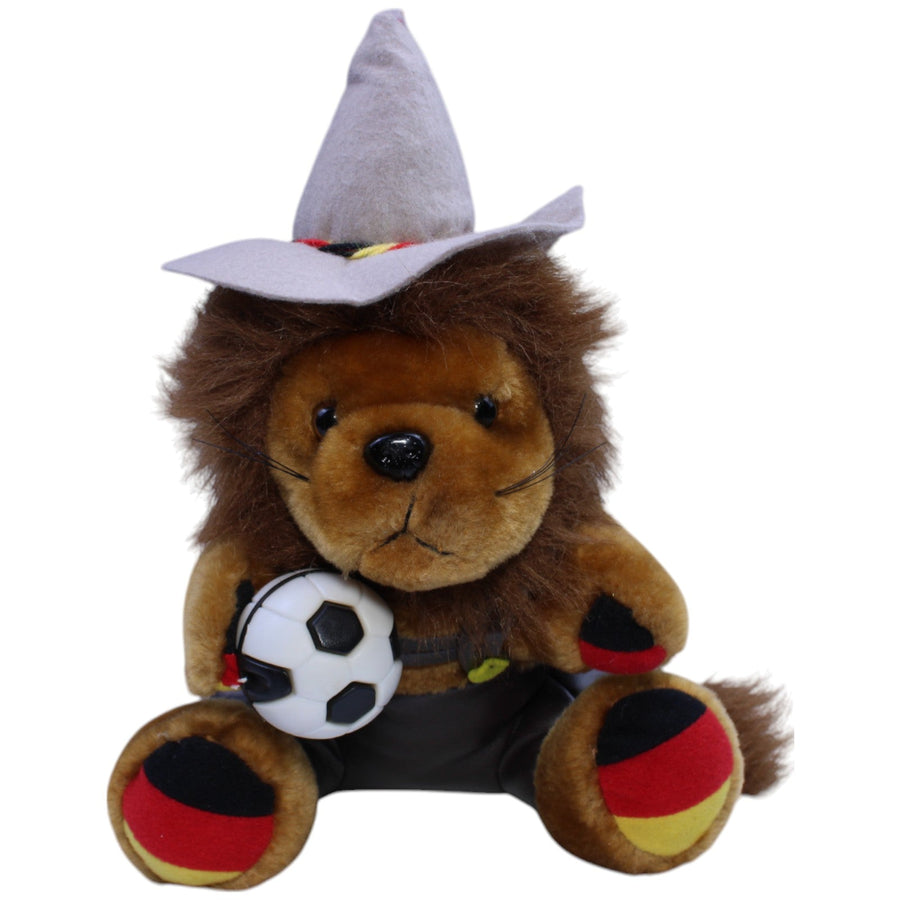 Löwe in Lederhose mit Fußball