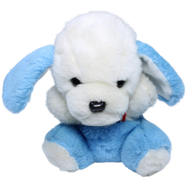 Hund mit Hosenträgern, blau
