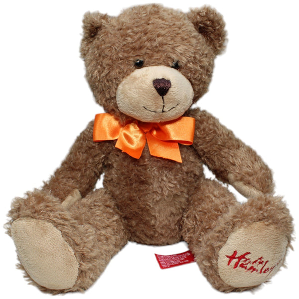 Teddybär mit oranger Schleifer