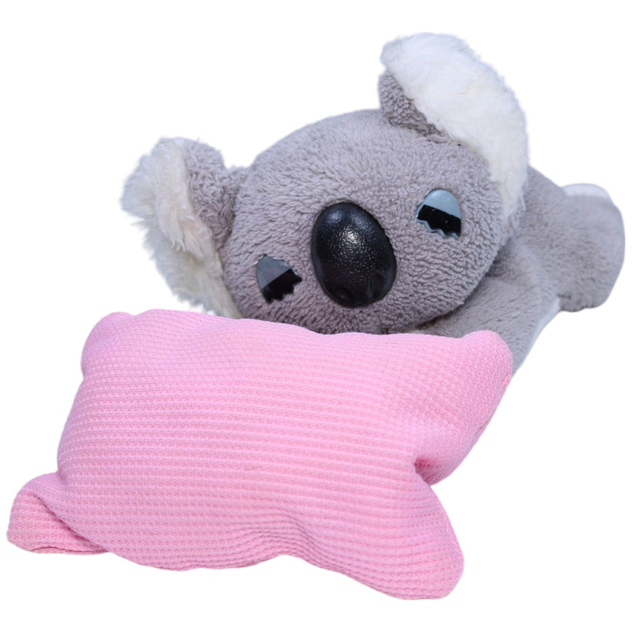 Koala mit rosa Kissen, liegend