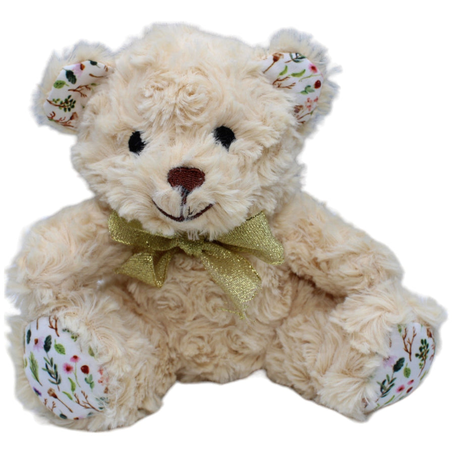 Süßer Teddybär mit Blumen an Ohren und Füßen