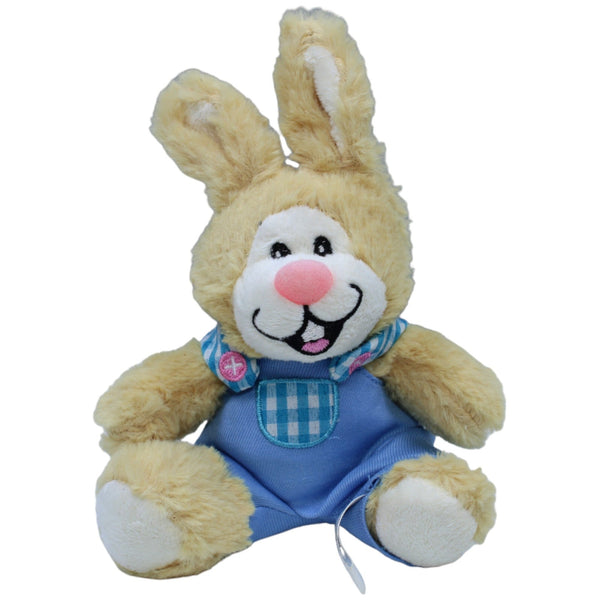 Süßer Hase in blauer Latzhose, sitzend