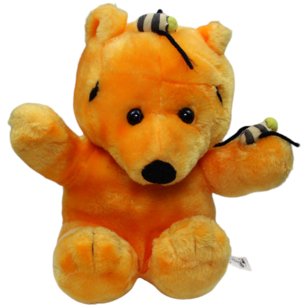 Oranger Bär mit Bienen