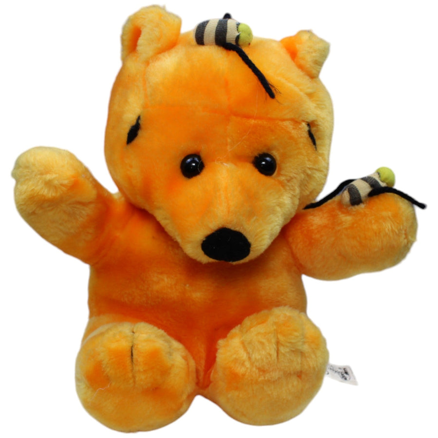 Oranger Bär mit Bienen