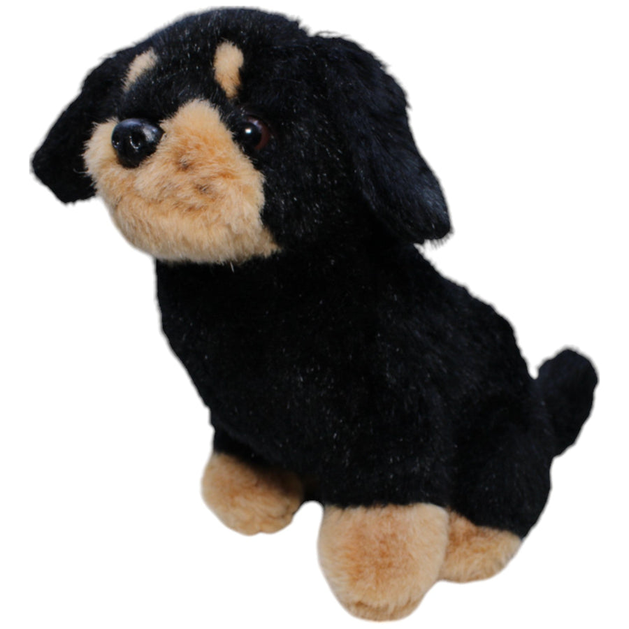 Rottweiler, sitzend