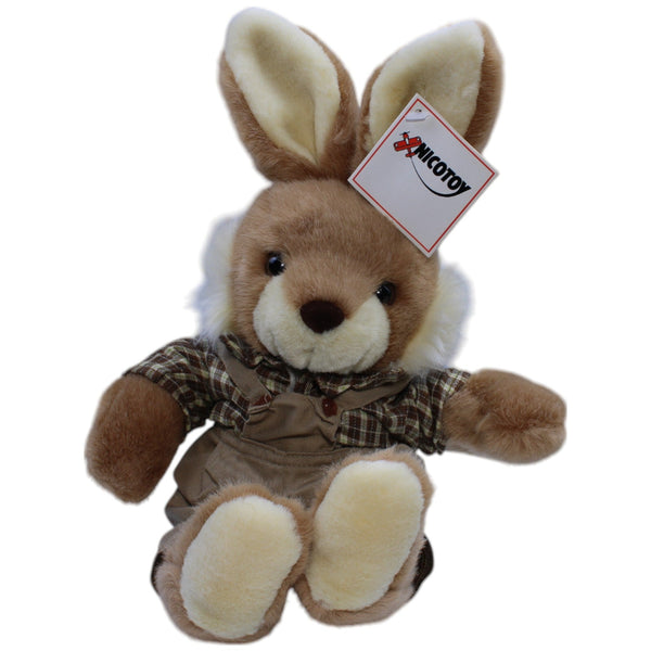 Süßer Hase in Latzhose und Hemd