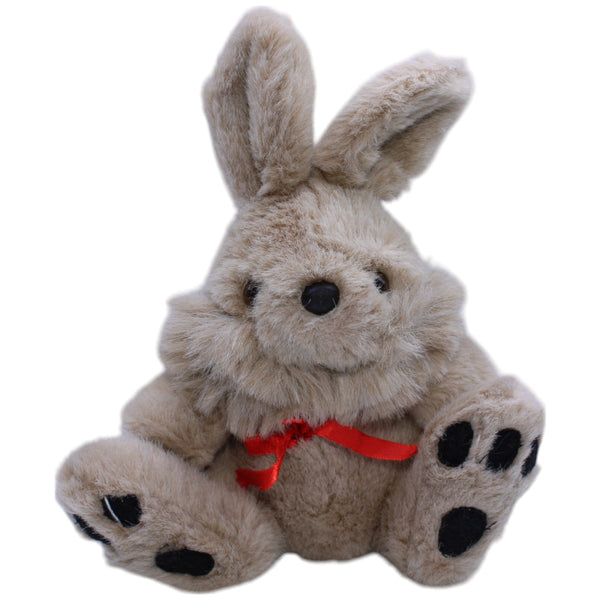 Hase mit roter Schleife, sitzend