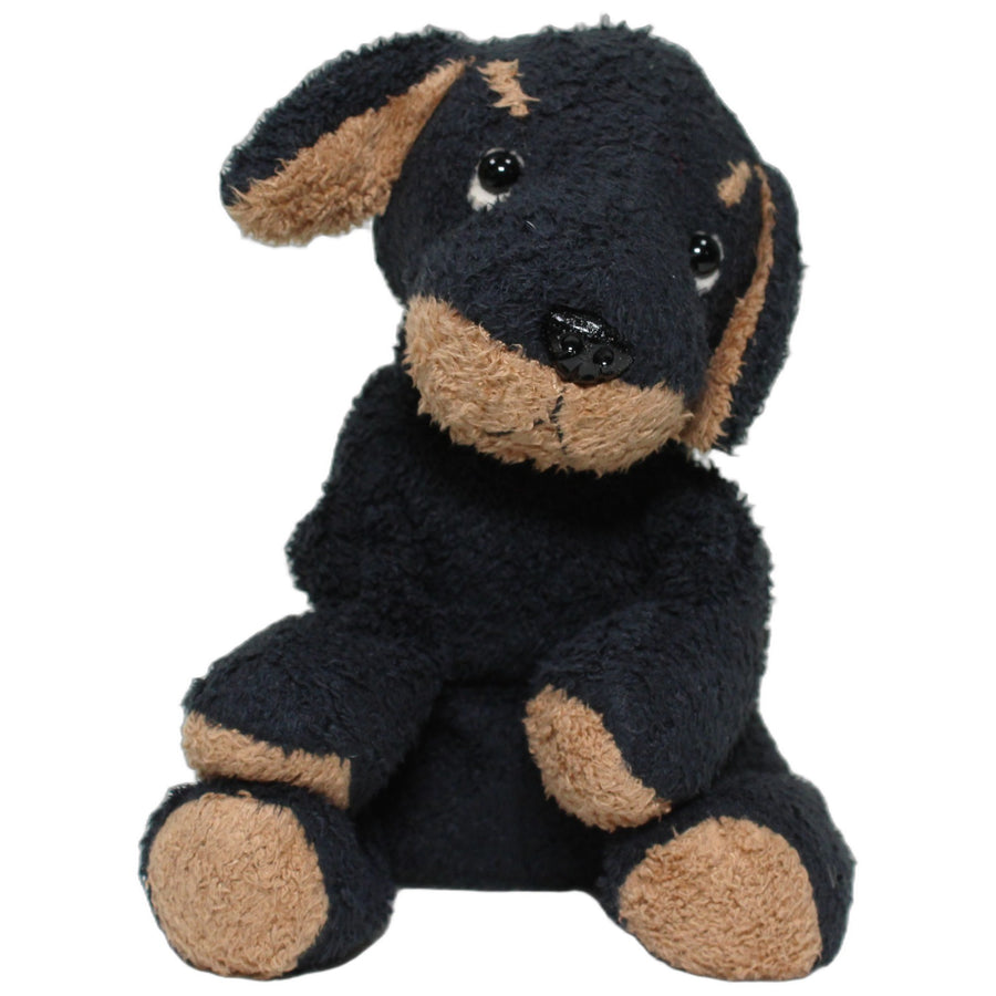 Kleiner schwarzer Hund Biscuit