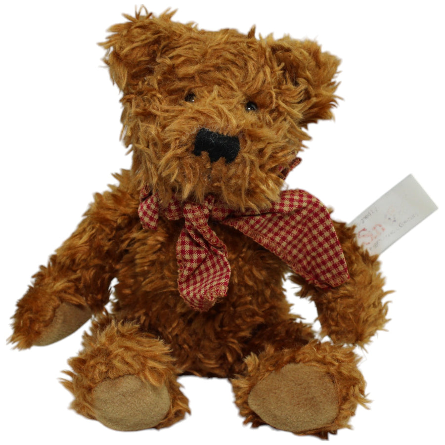 Teddybär mit rot-karierter Schleife