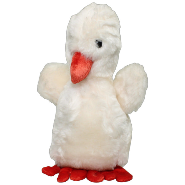 Schöne weiße Ente mit roten Füßen